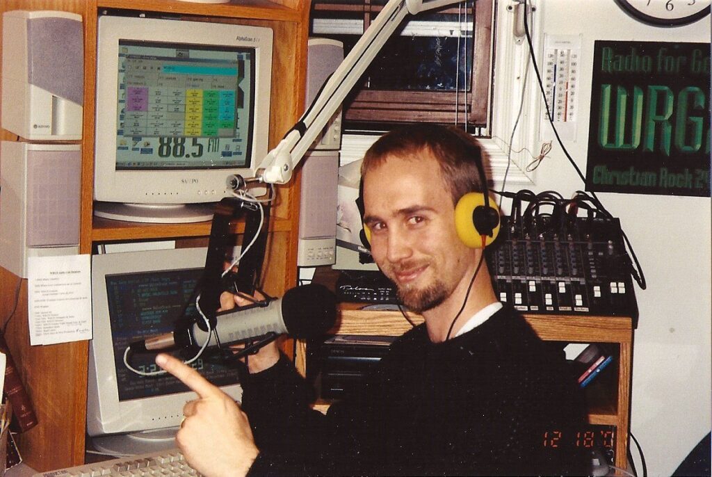 This is a image of Dave in front of an RE20 Microphone in the WRGX studio circa 2001. 